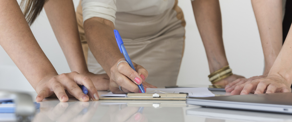 business-women-working-together-project-close-up.jpg