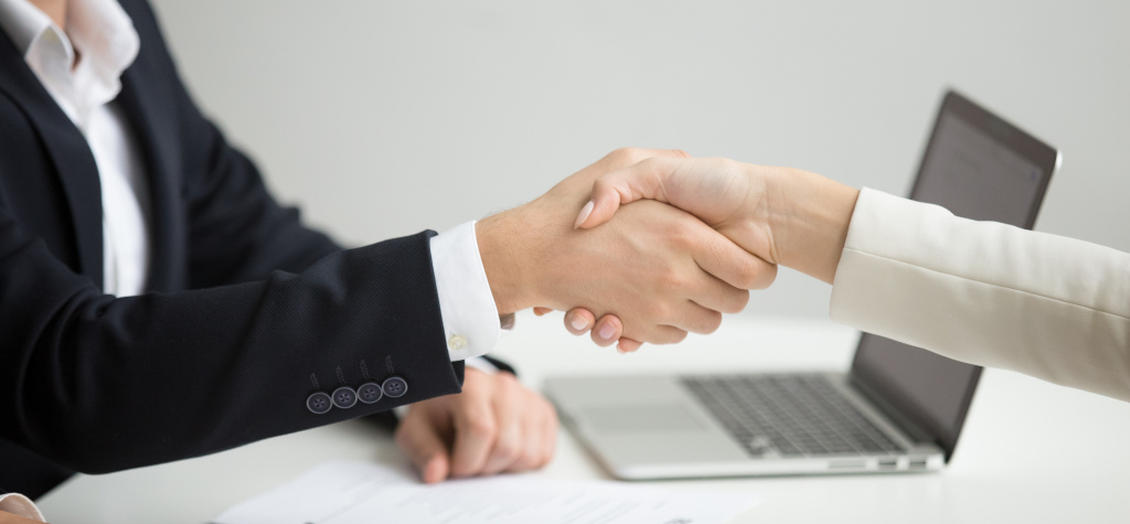 hr-handshaking-successful-candidate-getting-hired-new-job-closeup.jpg