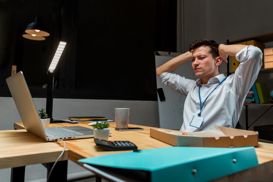 young-entrepreneur-working-night_23-2148499639.jpg