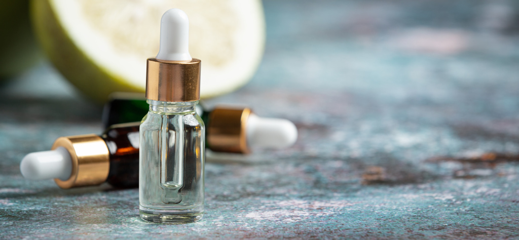 grapefruit-oil-serum-bottle-put-dark-background.jpg