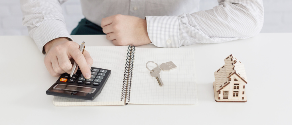 unrecognizable-realtor-counting-office.jpg