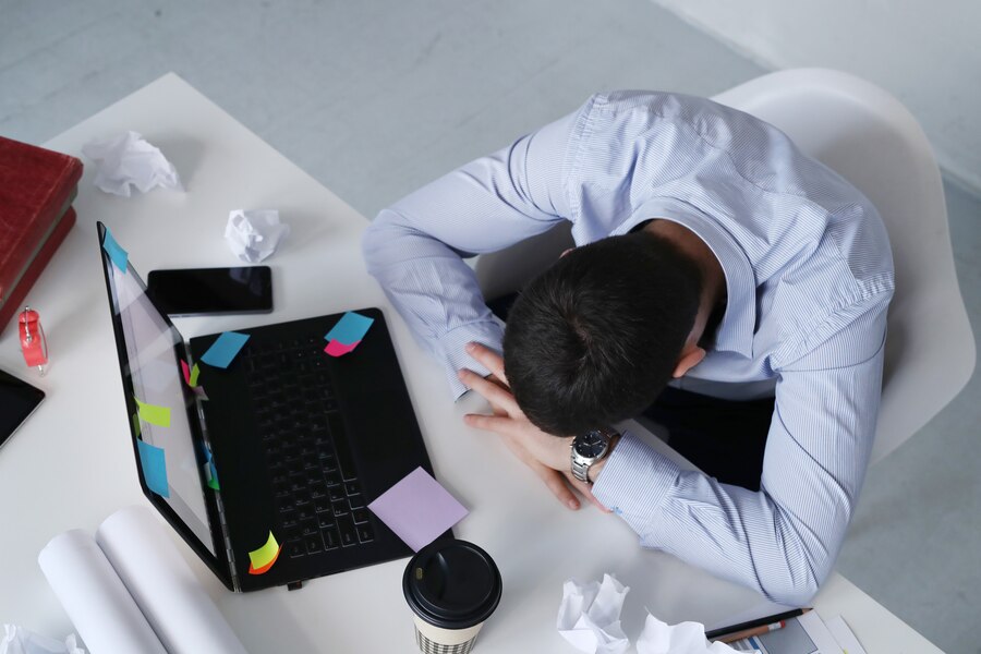 man-sleeping-work_144627-24923.jpg